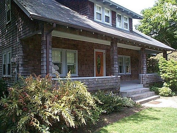 Charming 3 bed Cape with farmers porch and rear deck.