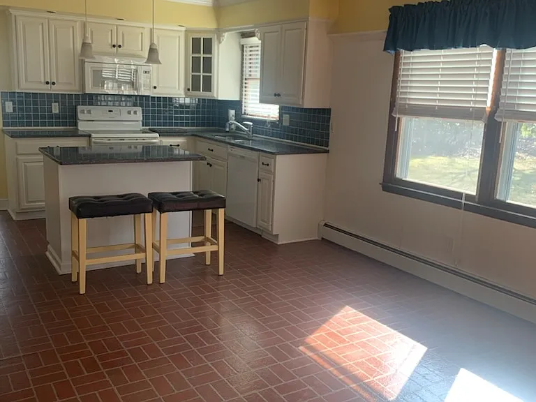 8325 Woodland Rd — Photo 1