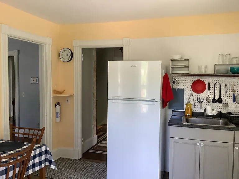 Kitchen, with Living Room & Stair Hall beyond