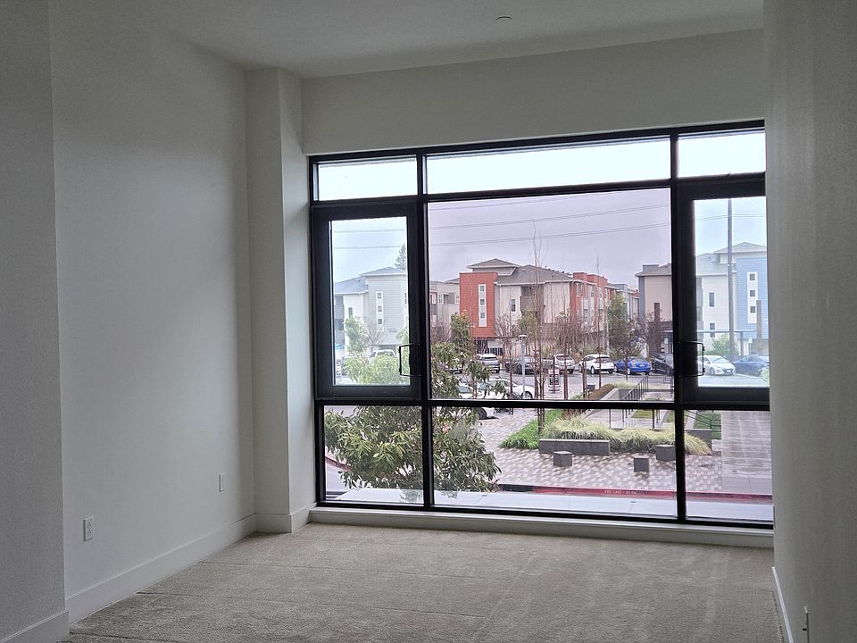 The soaring ceilings in the master suite elevate the entire space, giving it a luxurious and open ambiance~