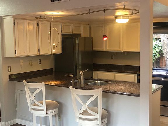 New light fixture to arrive next week (2 gold circular hanging pendants)