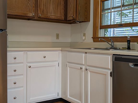 Stainless Steel Refrigerator, Stove and Dishwasher and sink with garbage disposal