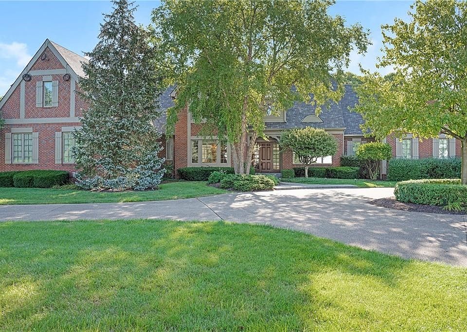 Stately Paul Estridge Sr Custom Home on the 9th Tee at Prairieview.