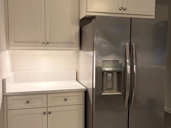 brand new cabinets throughout great prep place and stainless appliances