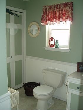 Half bath with beadboard and chair rail