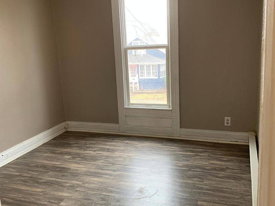 Street facing living room or bedroom, with large storage closet.