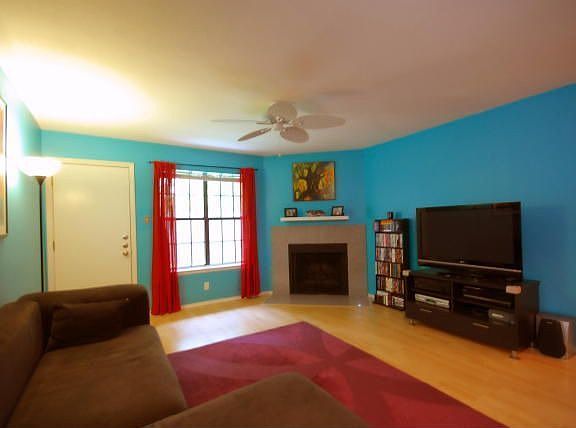 Living area with back door to patio