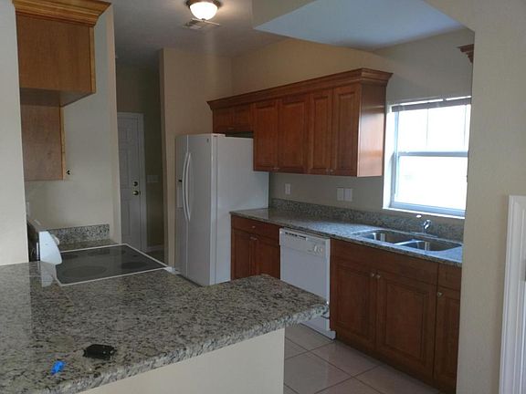 5th image of 7706 N Riverdale Ave