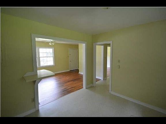 Kitchen looking into living room