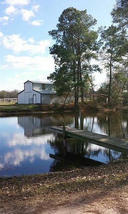 View over one of the ponds with Barn.