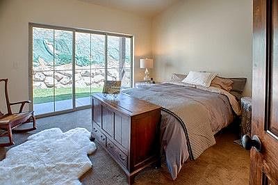 master bedroom with sliding glass doors to patio
