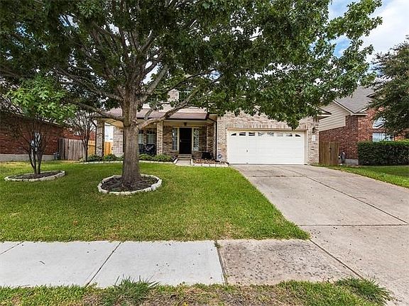 Front of home, beautiful brick.  Notice the sidewalks!