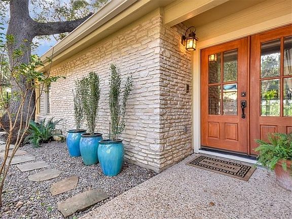 Gated courtyard offers privacy from the street.