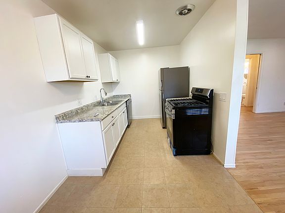 NEW KITCHEN - All new cabinets and appliances! Stainless Steel Refrigerator and Dishwasher with gas stove/oven.
