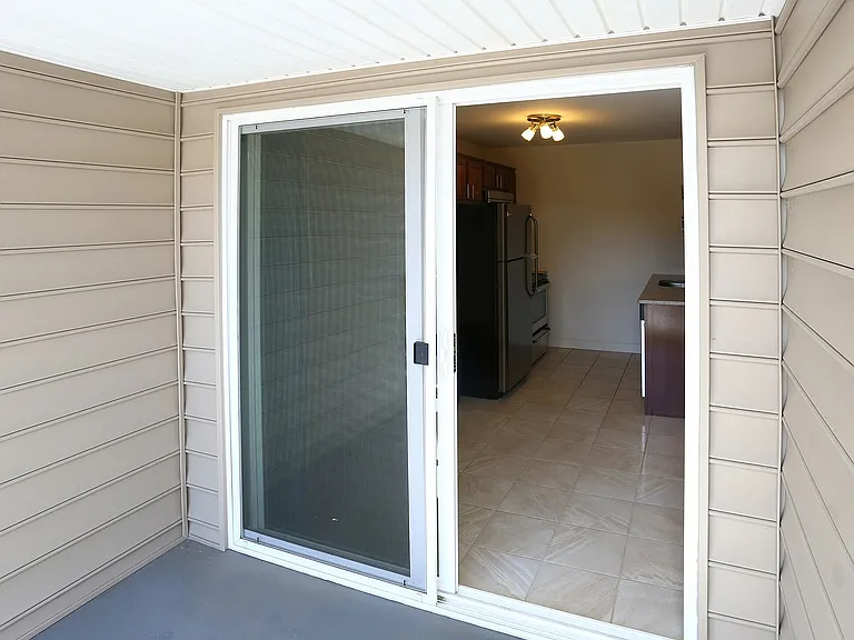 Step into a contemporary kitchen with this inviting entrance.