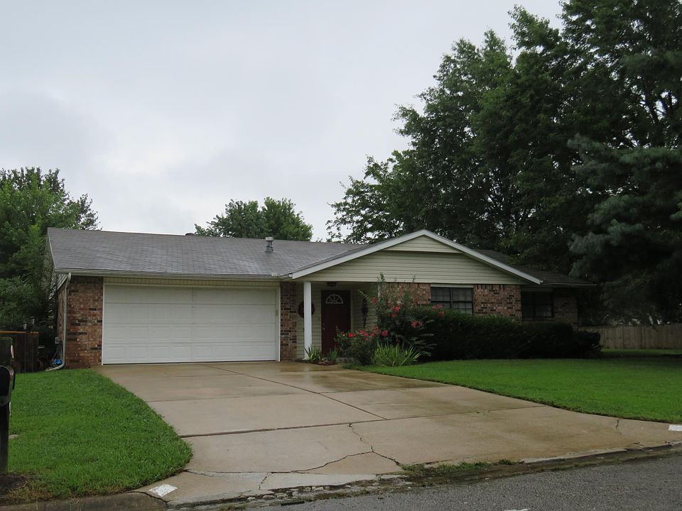 Front on nicely wooded corner lot