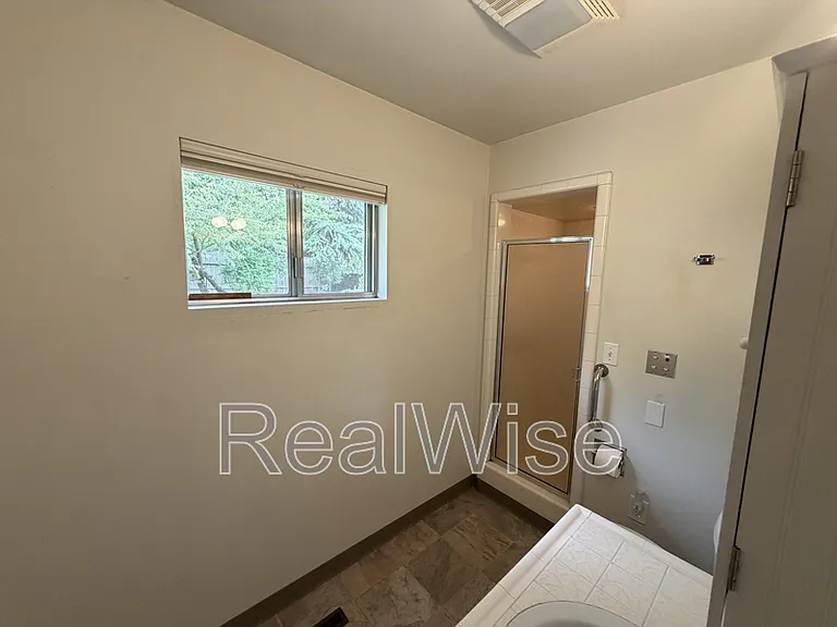 7730 SW Eaker Pl — Photo 44