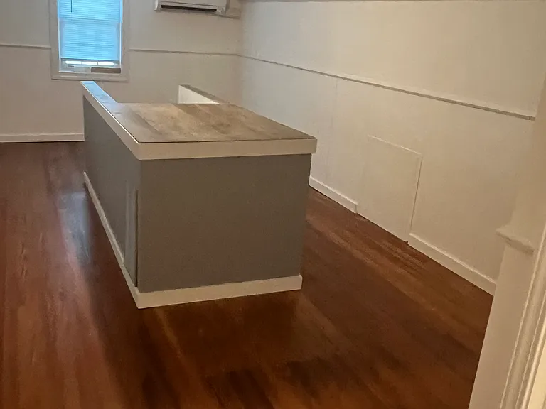upstairs bonus room (with knee wall around stairwell)