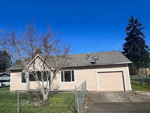 Front of house Corner of Chemawa Rd. and Chehalis Dr. N.