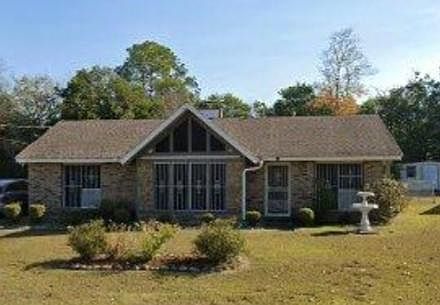 Front of house with stone decor
