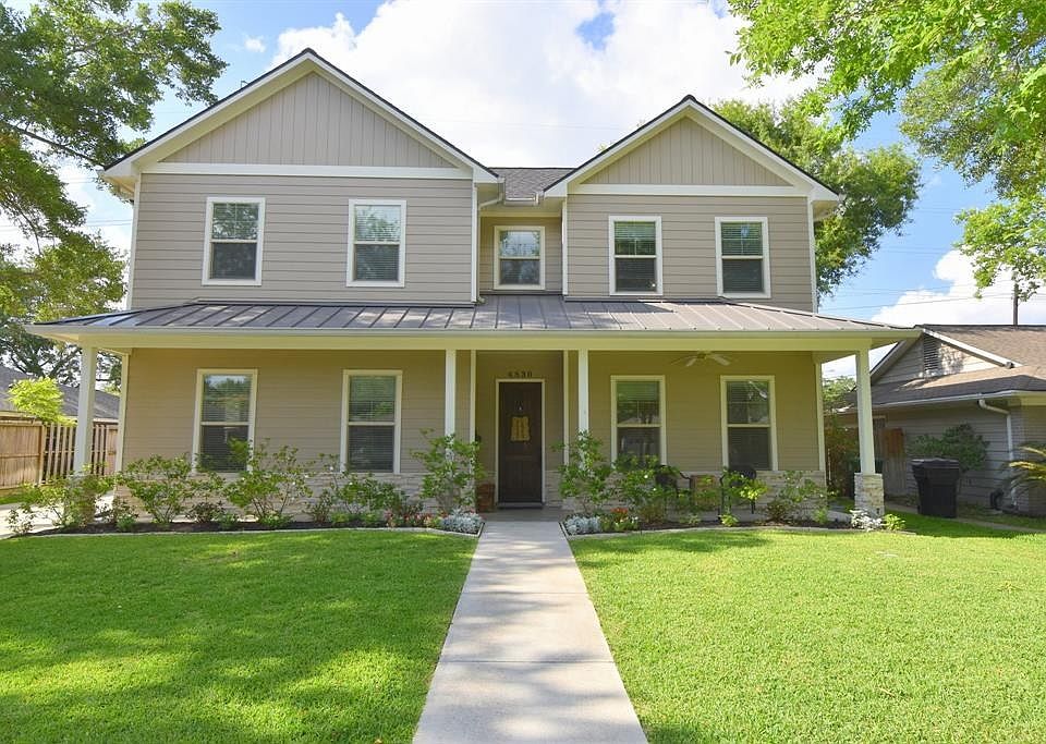 Open floor plan, island kitchen, vaulted ceilings, and 3" oak wood floors are just a few of the amazing features in this home.