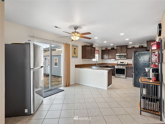 Large dining area off kitchen.  2nd fridge does not convey