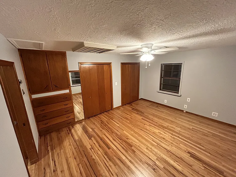 Master bedroom with lots of storage.