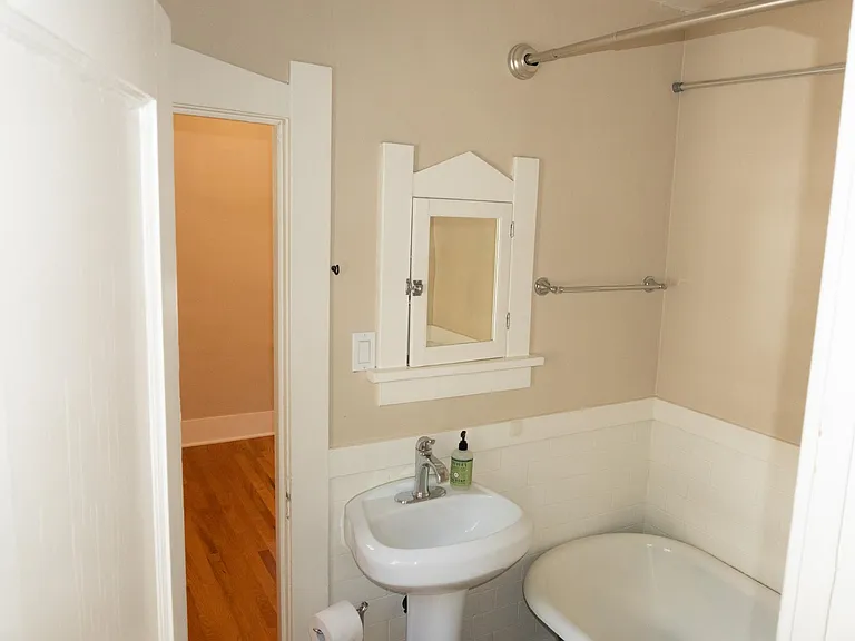 The main bathroom entered from the back bedroom.