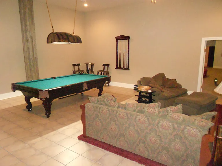 Gameroom with pool table.