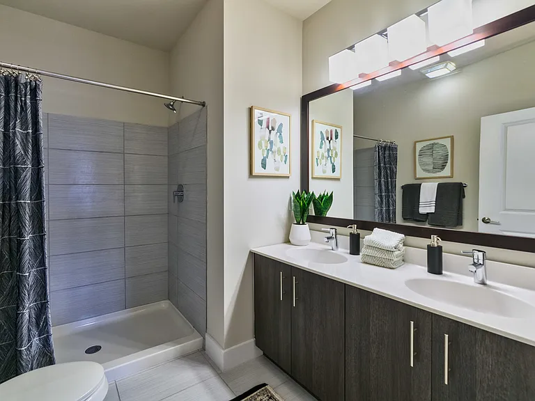 Townhome Tiled Shower & Double Sink Vanity