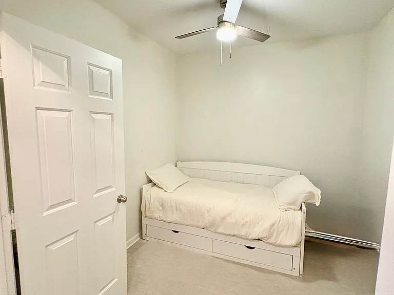Bonus room currently being used as a guest bedroom and play space