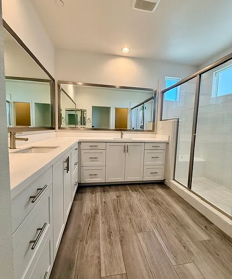 Primary bathroom with dual vanity