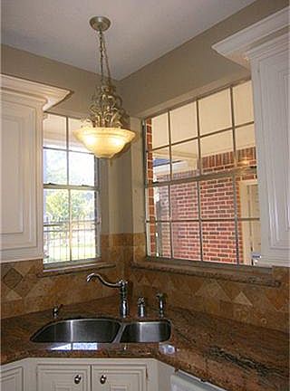 Upgraded fixtures and nice view to the front with these  two windows