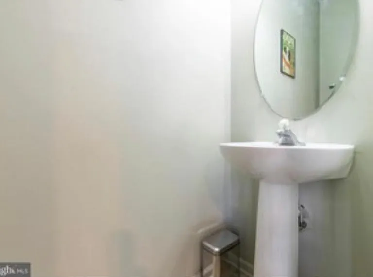 Half bath on open main floor plan.