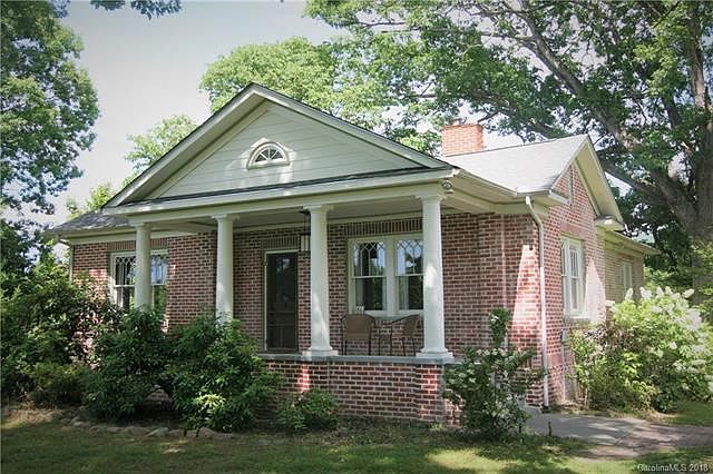 Renovated/Updated 1939 Arts and Crafts Bungalow on over ONE ACRE in Historic Oakley!