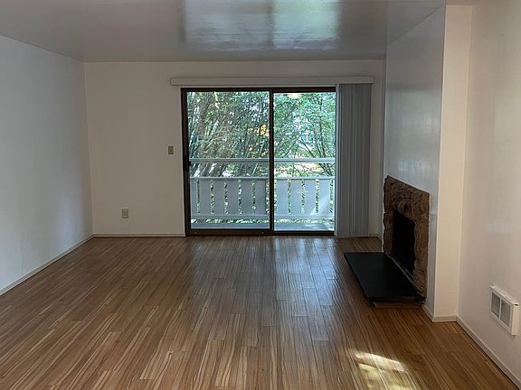 Living room, fireplace, deck