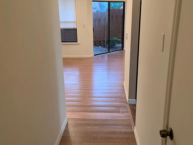 hallway from front door to living/dining room