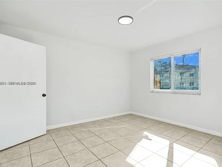 3398 NE 9th Dr #104 — Photo 12