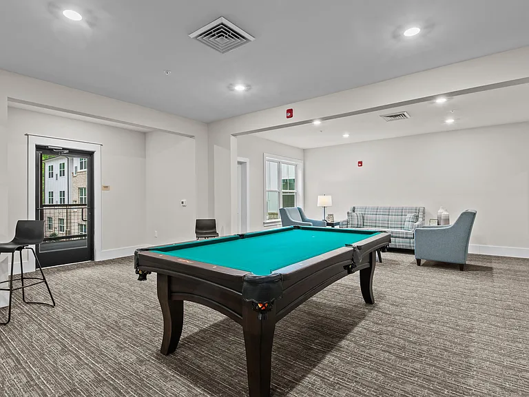 Active Adult clubhouse space with pool table
