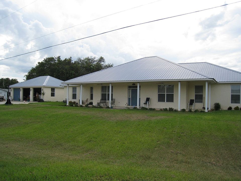 House on corner lot with 3+ car garage