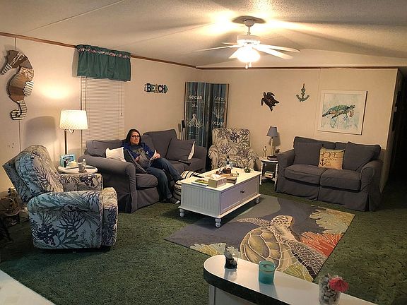 Living w/ coastal furnishing
