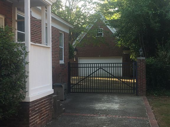 Driveway/Gated Back Yard