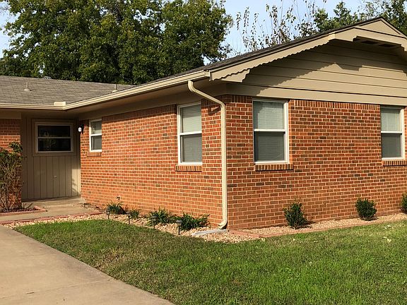 Front yard and flowerbeds.