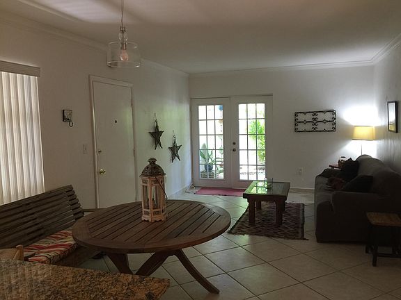 Dining room & living room viewed from kitchen bar table