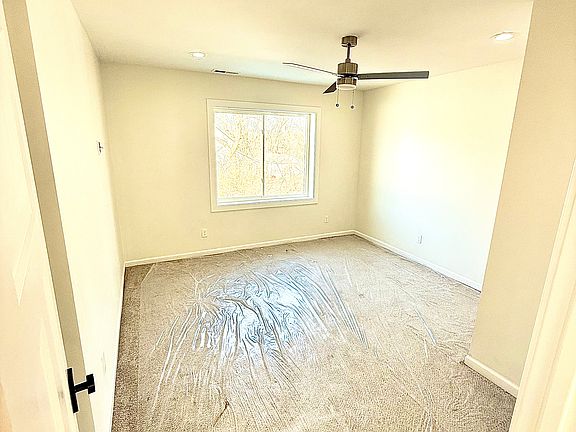 Large primary bedroom with ensuite luxury spa like bath