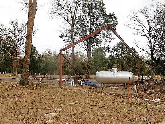 3600 sq. ft. concrete slab plumbed for baths  and kitchen areas.