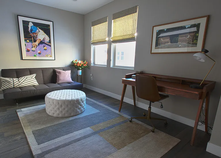 Flex Room, couch can pull out into double size bed. A folding room divider can be placed adjacent to desk for greater privacy in third bedroom.