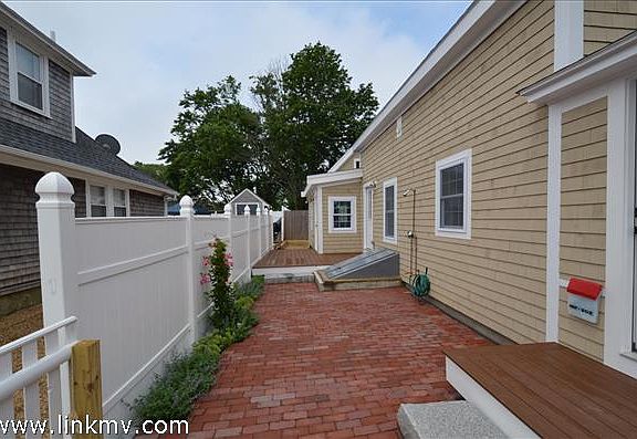 Shared brick walk ways, all units include individual outside showers.
