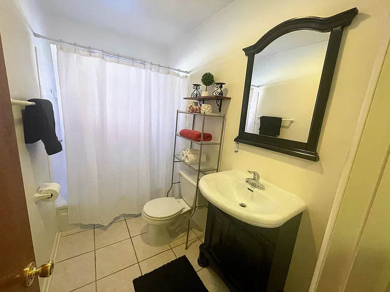 View of full bathroom from doorway