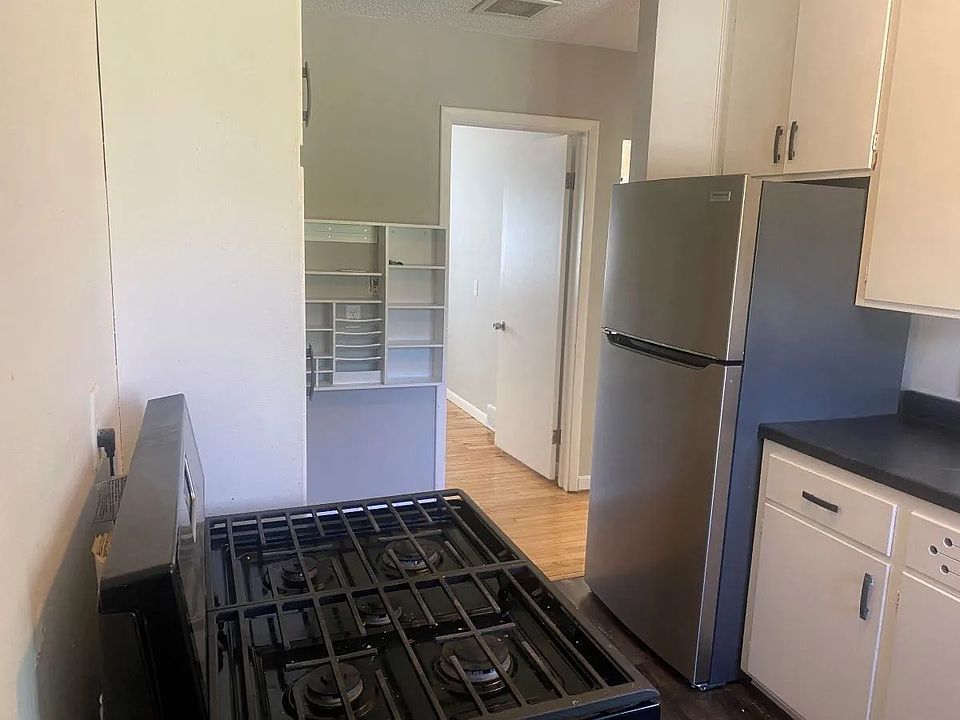 Clean and functional kitchen featuring stainless steel appliances, ample cabinet space, and natural light that brightens the space. Designed for everyday convenience and easy living.